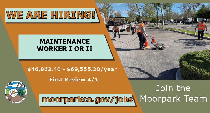 Maintenance Workers striping a parking lot