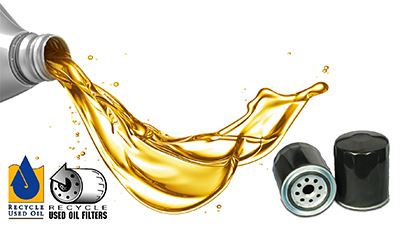 Picture of motor oil filters and oil being poured out of a container